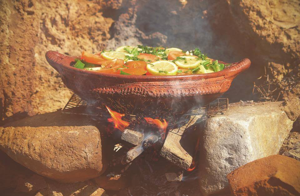Food cooking in clay pot in open enviorment