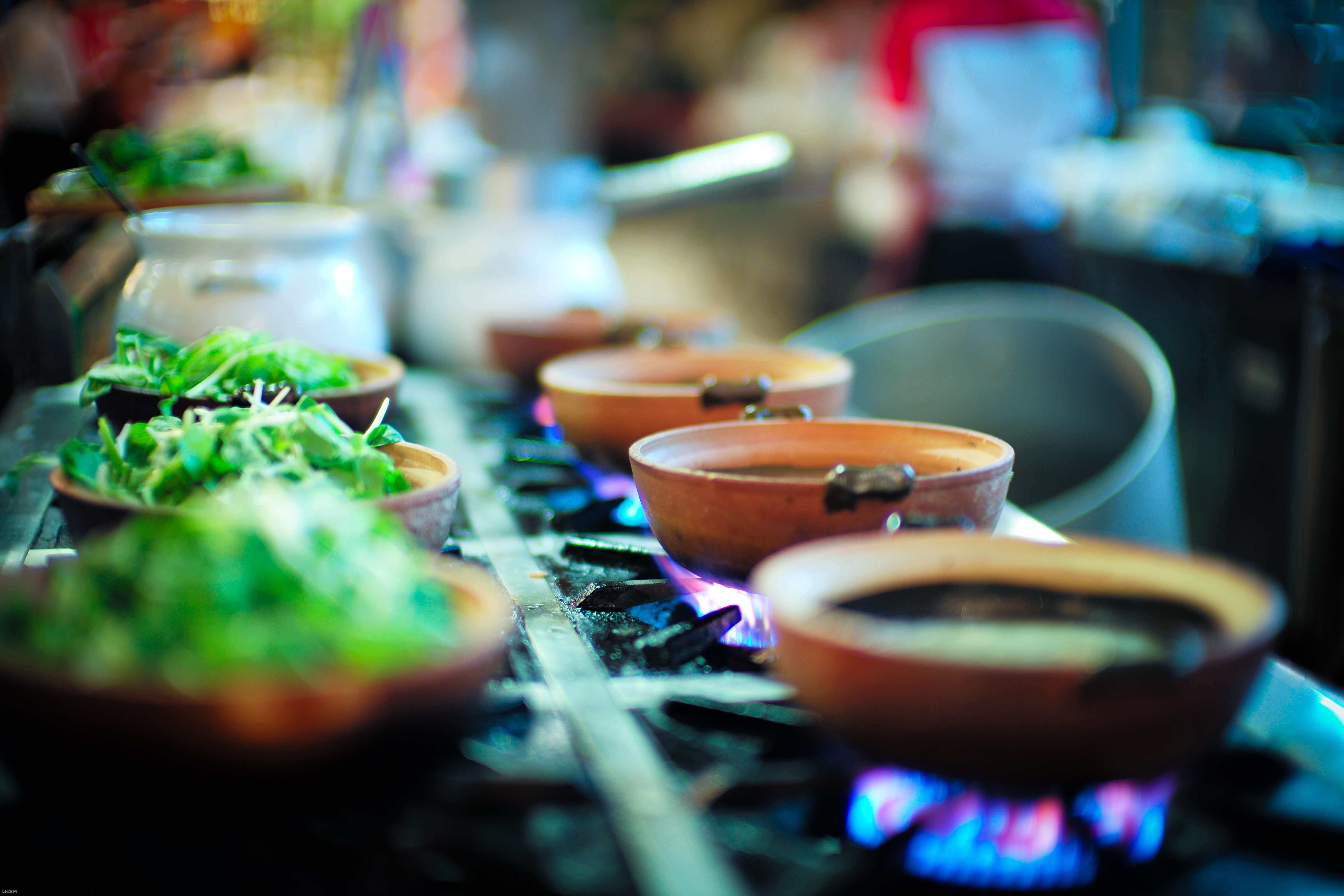 Food cooking in clay pots